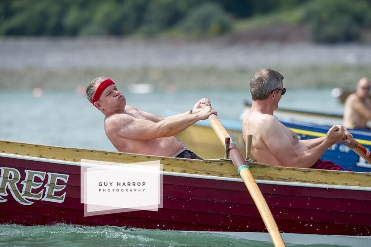 Photo by Guy Harrop. Gig rowers decend on the historical fishing village of Clovelly at the weekend taking part in the 13th gig racing regatta, Devon. The scenic herring fishing village provided a dramatic backdrop as the traditional wooden gigs battled it out in the annual event. image copyright guy harrop info@guyharrop.com 07866 464282