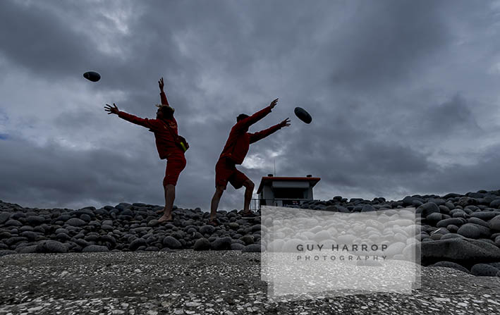 Photo by Guy Harrop. 19/8/26. Large spring tide cleanup. RNLI lifegeuards Andy Tobin and Mark Mckellar clear large pebbles from the walkway at Pebbleridge in Westward Ho! in Devon as the UK braces itself for the high spring tides at the weekend.  image copyright guy harrop info@guyharrop.com 07866 464282