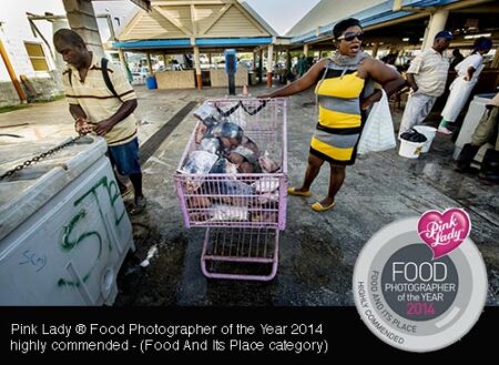 PIC BY GUY HARROP. Bridgetown, Barbados. Shopping trolley packed with fresh tuna and dolphin (mahi-mahi) in  Bridgetown fish market in Barbados. It is the island's biggest fishmarket where tonnes of fresh fish are landed at the waterfront for customers and suppliers to pick what they need and load up their trolleys for weighing.